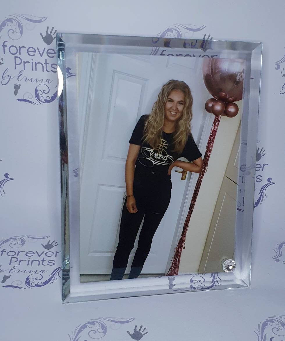 Printed glass photo frame, freestanding.