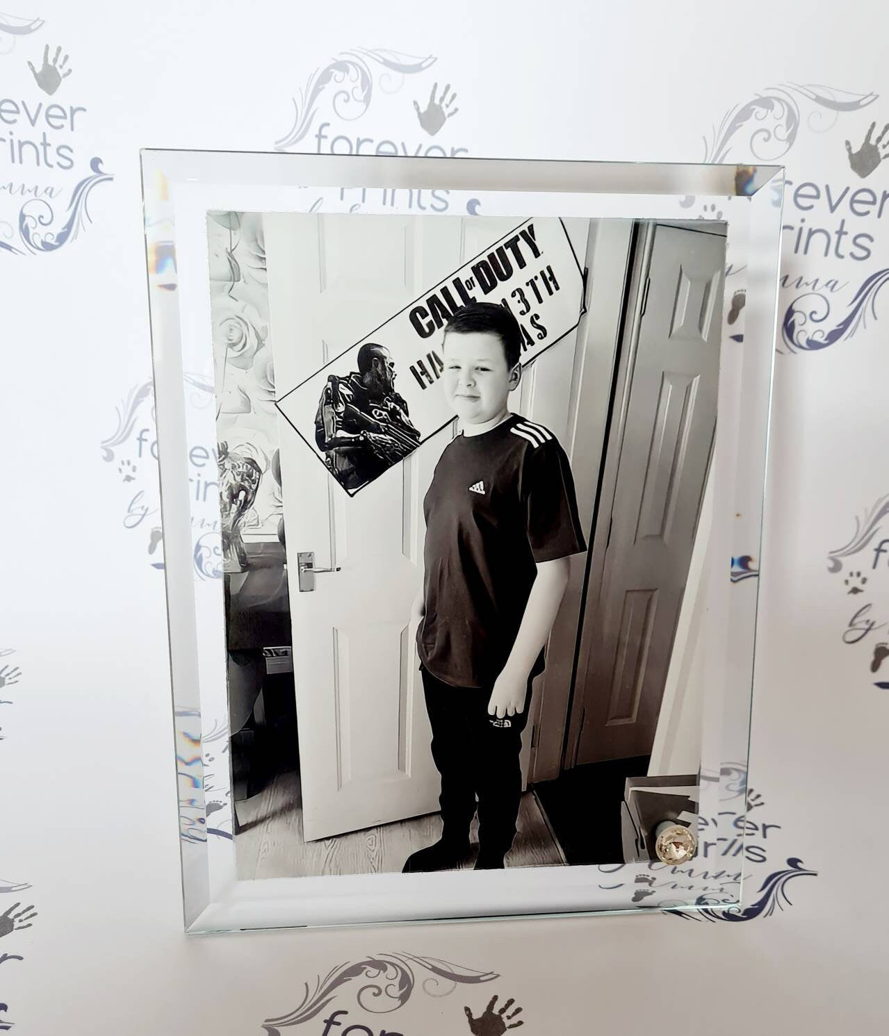 Printed glass photo frame, freestanding.