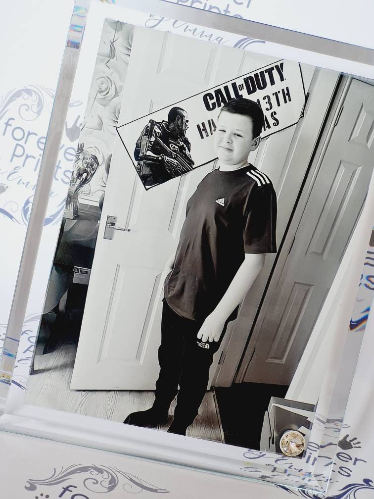 Printed glass photo frame, freestanding.